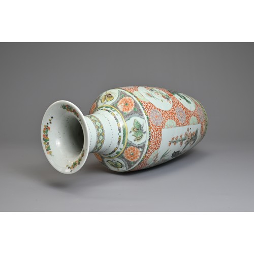 74 - A CHINESE FAMILLE ROSE PORCELAIN VASE, 19TH CENTURY.   Of baluster form decorated with rectangular p... 