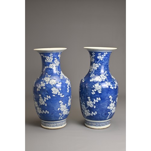 78 - A GOOD LARGE PAIR OF CHINESE BLUE AND WHITE PORCELAIN PRUNUS VASES, 19TH CENTURY. Each of baluster f... 