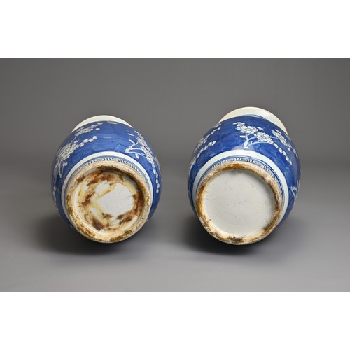 78 - A GOOD LARGE PAIR OF CHINESE BLUE AND WHITE PORCELAIN PRUNUS VASES, 19TH CENTURY. Each of baluster f... 