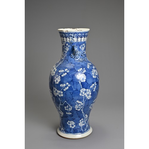 79 - A CHINESE BLUE AND WHITE PORCELAIN VASE, 19TH CENTURY. Of baluster form with two looped handles, wit... 