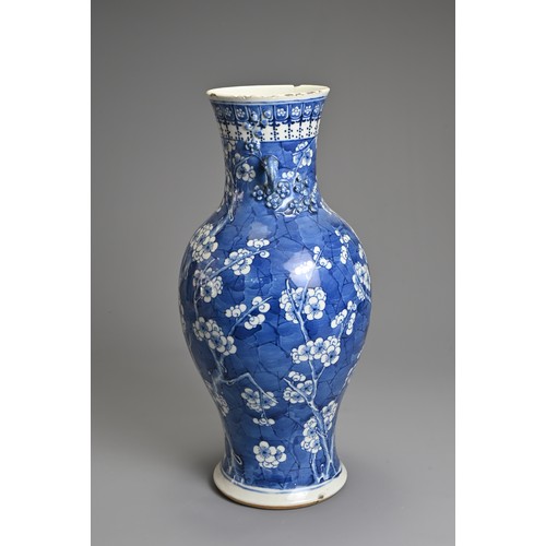 79 - A CHINESE BLUE AND WHITE PORCELAIN VASE, 19TH CENTURY. Of baluster form with two looped handles, wit... 