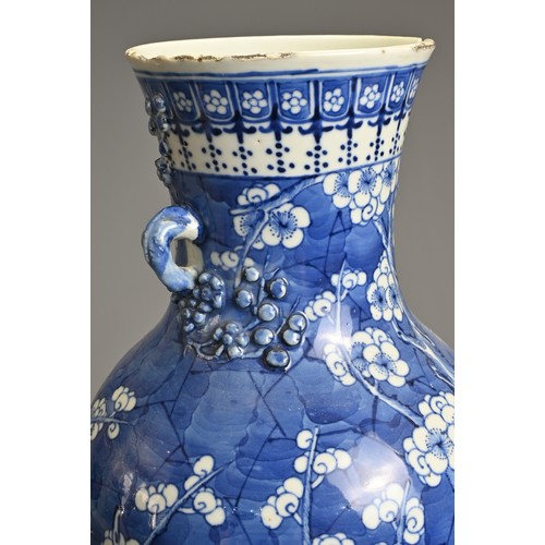 79 - A CHINESE BLUE AND WHITE PORCELAIN VASE, 19TH CENTURY. Of baluster form with two looped handles, wit... 