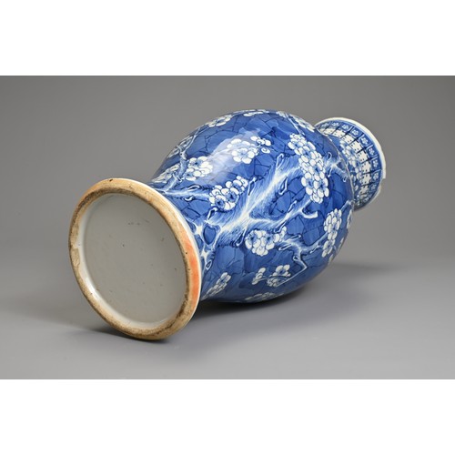 79 - A CHINESE BLUE AND WHITE PORCELAIN VASE, 19TH CENTURY. Of baluster form with two looped handles, wit... 