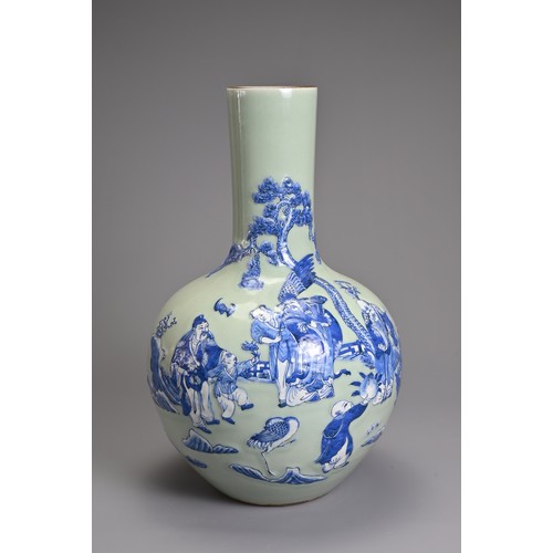 80 - A CHINESE CELADON GROUND BLUE AND WHITE PORCELAIN VASE, 20TH CENTURY. Tianqiuping shape with raised ... 