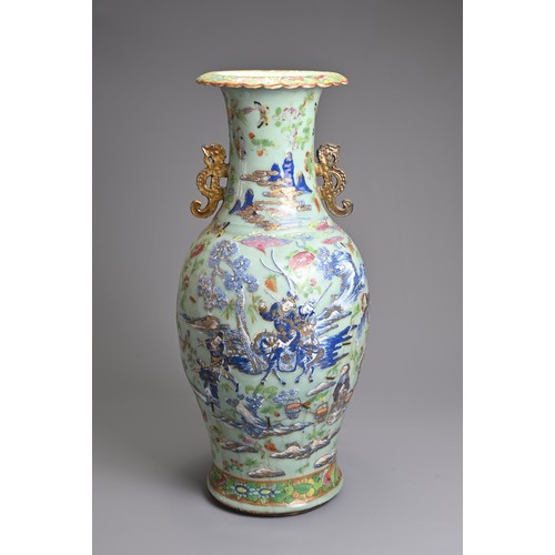 83 - A LARGE CHINESE CELADON GROUND FAMILLE ROSE PORCELAIN VASE, 19TH CENTURY. Of baluster form with rais... 