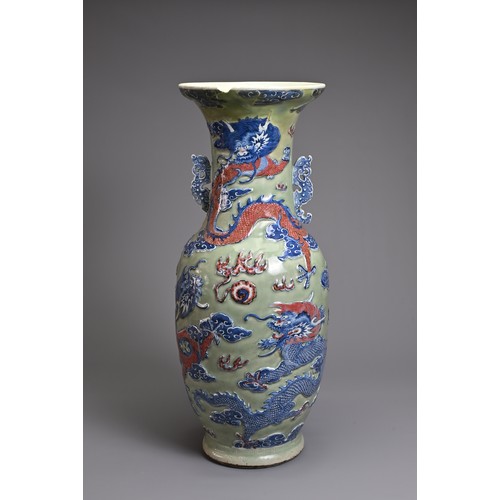 84 - A LARGE CHINESE CELADON GROUND UNDERGLAZE BLUE AND COPPER RED PORCELAIN VASE, 19TH CENTURY. Of balus... 