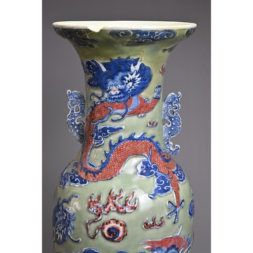 84 - A LARGE CHINESE CELADON GROUND UNDERGLAZE BLUE AND COPPER RED PORCELAIN VASE, 19TH CENTURY. Of balus... 