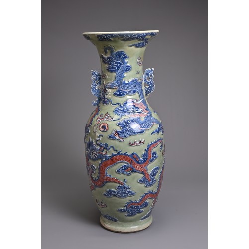 84 - A LARGE CHINESE CELADON GROUND UNDERGLAZE BLUE AND COPPER RED PORCELAIN VASE, 19TH CENTURY. Of balus... 