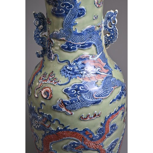 84 - A LARGE CHINESE CELADON GROUND UNDERGLAZE BLUE AND COPPER RED PORCELAIN VASE, 19TH CENTURY. Of balus... 