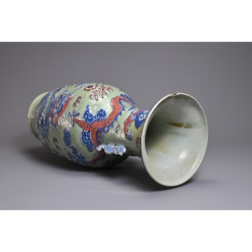 84 - A LARGE CHINESE CELADON GROUND UNDERGLAZE BLUE AND COPPER RED PORCELAIN VASE, 19TH CENTURY. Of balus... 