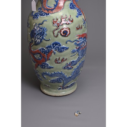 84 - A LARGE CHINESE CELADON GROUND UNDERGLAZE BLUE AND COPPER RED PORCELAIN VASE, 19TH CENTURY. Of balus... 