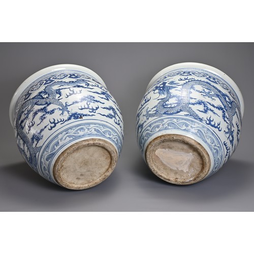 90 - A GOOD LARGE PAIR OF CHINESE BLUE AND WHITE PORCELAIN JARDINIERS, 19TH CENTURY. Heavily potted, deco... 