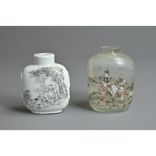 100 - TWO CHINESE SNUFF BOTTLES, EARLY 20TH CENTURY. To include a white glazed porcelain bottle with Taoti... 