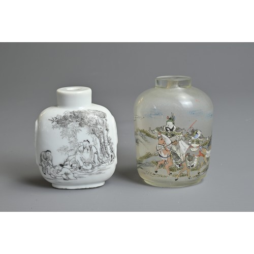 100 - TWO CHINESE SNUFF BOTTLES, EARLY 20TH CENTURY. To include a white glazed porcelain bottle with Taoti... 