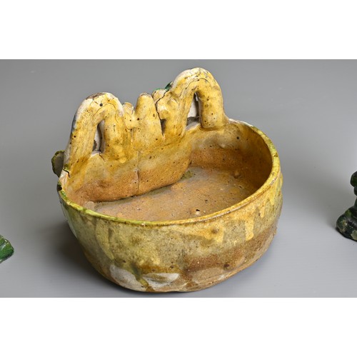 63 - TWO CHINESE GLAZED SHIWAN POTTERY ITEMS, 19/20TH CENTURY. To include a pair of green glazed joss sti... 