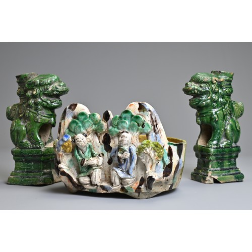 63 - TWO CHINESE GLAZED SHIWAN POTTERY ITEMS, 19/20TH CENTURY. To include a pair of green glazed joss sti... 