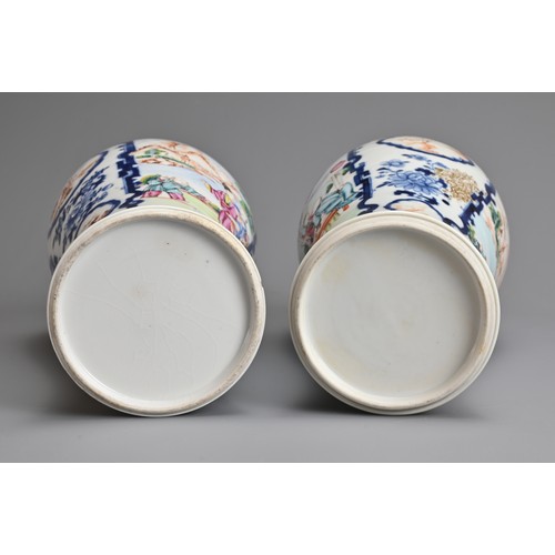 56 - A PAIR OF CHINESE FAMILLE ROSE PORCELAIN VASES, QIANLONG, 18TH CENTURY. Of baluster form decorated w... 