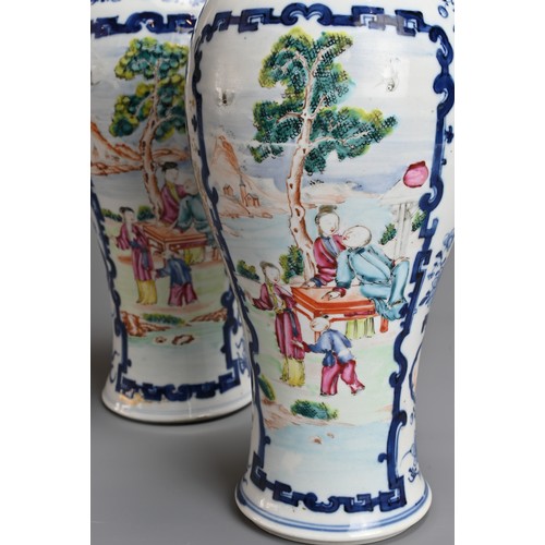 56 - A PAIR OF CHINESE FAMILLE ROSE PORCELAIN VASES, QIANLONG, 18TH CENTURY. Of baluster form decorated w... 