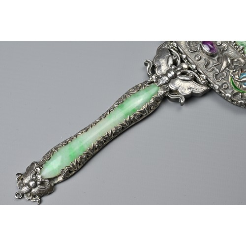 6 - A CHINESE EXPORT SILVER HAND MIRROR, EARLY 20TH CENTURY. On a butterfly handle with jade insert with... 