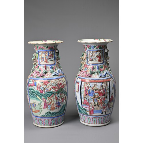 26 - A LARGE PAIR OF CHINESE FAMILLE ROSE PORCELAIN VASES, 19TH CENTURY. Of baluster form decorated with ... 