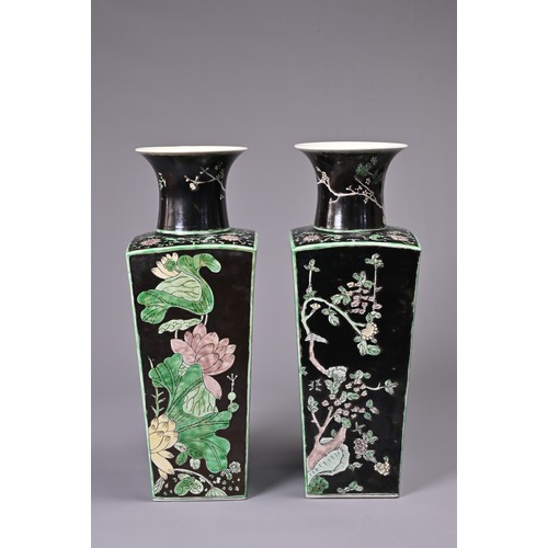 28 - A LARGE PAIR OF CHINESE FAMILLE NOIRE TAPERED SQUARE FORM VASES, EARLY 20TH CENTURY. Decorated in en... 