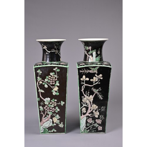 28 - A LARGE PAIR OF CHINESE FAMILLE NOIRE TAPERED SQUARE FORM VASES, EARLY 20TH CENTURY. Decorated in en... 