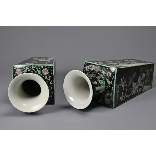 28 - A LARGE PAIR OF CHINESE FAMILLE NOIRE TAPERED SQUARE FORM VASES, EARLY 20TH CENTURY. Decorated in en... 