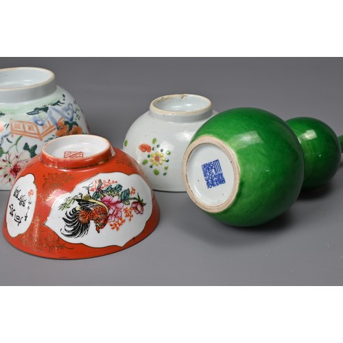 34 - A GROUP OF CHINESE PORCELAIN ITEMS, 18TH CENTURY AND LATER. To include a green glazed double gourd v... 