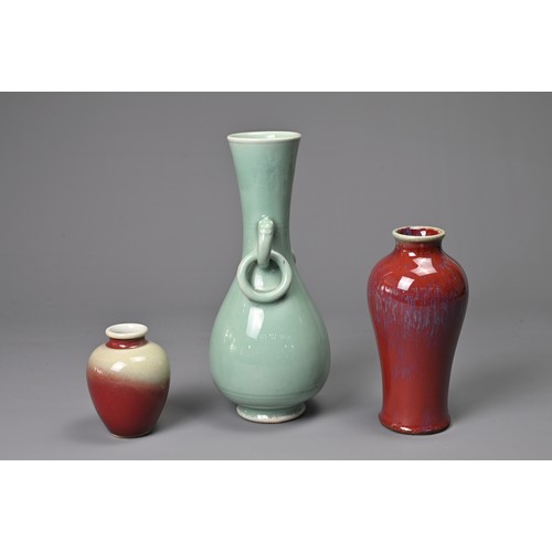 38 - THREE CHINESE PORCELAIN VASES, PROBABLY 20TH CENTURY. To include a celadon glazed pear shaped bottle... 