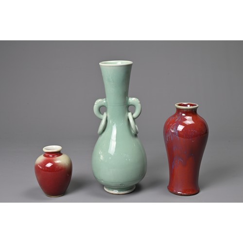 38 - THREE CHINESE PORCELAIN VASES, PROBABLY 20TH CENTURY. To include a celadon glazed pear shaped bottle... 