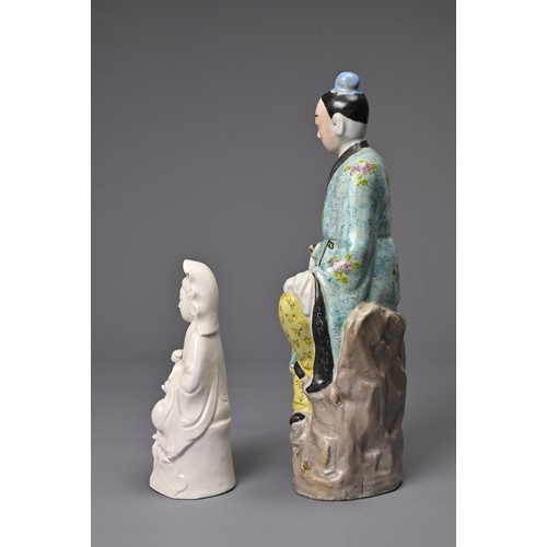 41 - TWO CHINESE PORCELAIN FIGURES, 20TH CENTURY. To include a polychrome decorated figure of a man seate... 