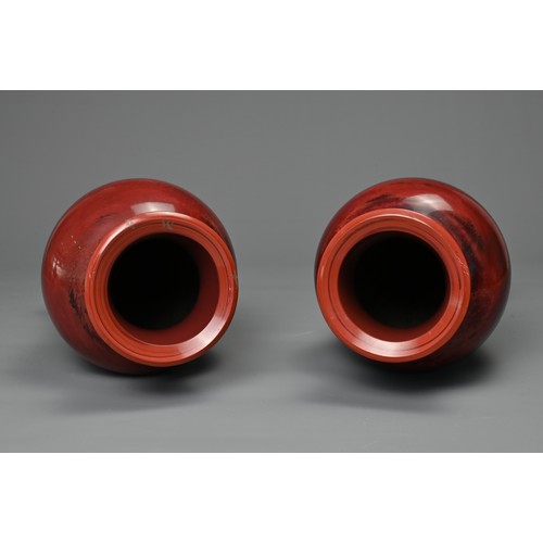 44 - A PAIR OF CHINESE REALGAR GLASS VASES, 19/20TH CENTURY. Each of baluster form carved from red glass ... 