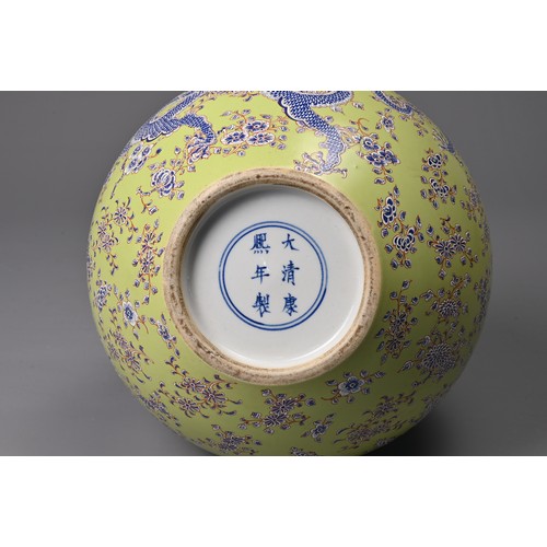 47 - A CHINESE LIME GREEN GROUND TIANQIUPING, KANGXI MARK, 20TH CENTURY. Globular body leading into a tal... 