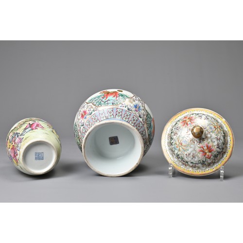 62 - TWO CHINESE POLYCHROME DECORATED PORCELAIN ITEMS, 20TH CENTURY. To include a globular pot and cover ... 