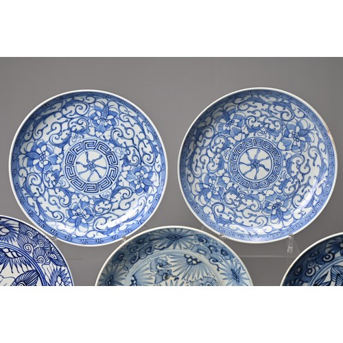 64 - A GROUP OF FIVE CHINESE BLUE AND WHITE PORCELAIN DISHES, 19TH CENTURY. Each with stylised floral dec... 