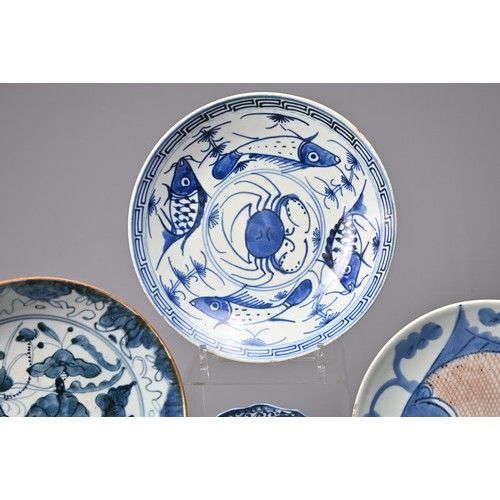 65 - A GROUP OF CHINESE BLUE AND WHITE PORCELAIN DISHES,  18/19TH CENTURY. Of varying designs including a... 