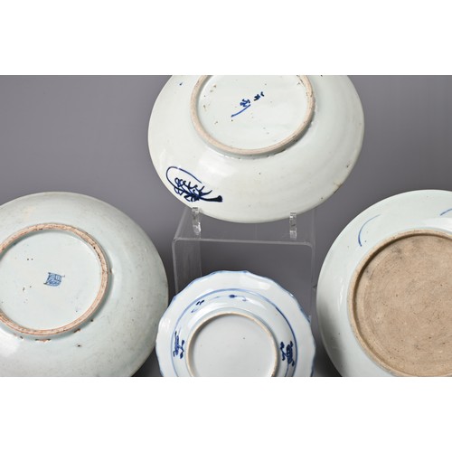 65 - A GROUP OF CHINESE BLUE AND WHITE PORCELAIN DISHES,  18/19TH CENTURY. Of varying designs including a... 