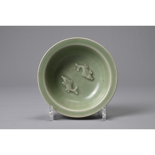 69 - A CHINESE LONGQUAN CELADON TWIN FISH PORCELAIN DISH. Fish well detailed and applied in high relief s... 