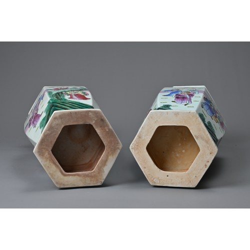 74 - A LARGE PAIR OF VINTAGE CHINESE POLYCHROME ENAMELLED PORCELAIN VASES, 20TH CENTURY. Of hexagonal for... 