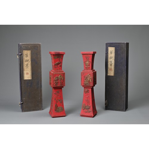 76 - A PAIR OF CHINESE INK STONE IN THE FORM OF CANDLE STICKS, 20TH CENTURY WITH BOXES. Each of square fo... 