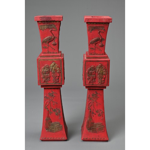 76 - A PAIR OF CHINESE INK STONE IN THE FORM OF CANDLE STICKS, 20TH CENTURY WITH BOXES. Each of square fo... 