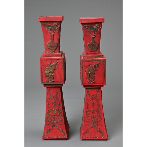 76 - A PAIR OF CHINESE INK STONE IN THE FORM OF CANDLE STICKS, 20TH CENTURY WITH BOXES. Each of square fo... 