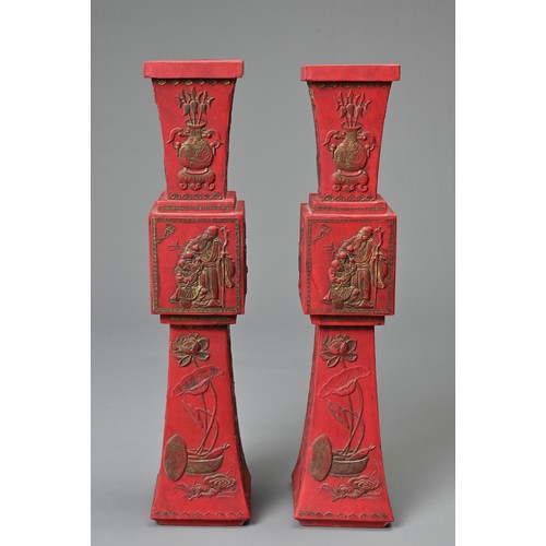 76 - A PAIR OF CHINESE INK STONE IN THE FORM OF CANDLE STICKS, 20TH CENTURY WITH BOXES. Each of square fo... 