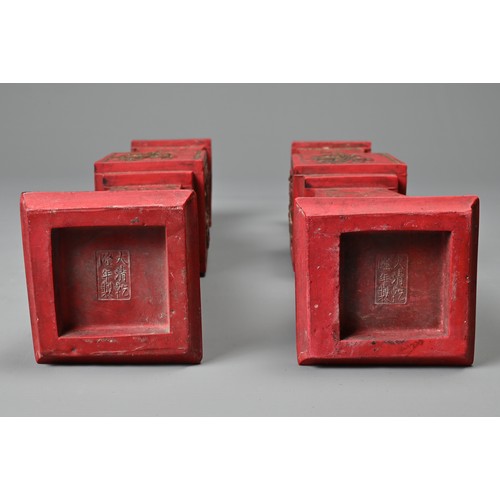 76 - A PAIR OF CHINESE INK STONE IN THE FORM OF CANDLE STICKS, 20TH CENTURY WITH BOXES. Each of square fo... 