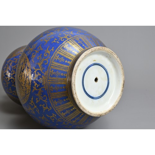 42 - A CHINESE BLUE GROUND AND GILT DECORATED DOUBLE GOURD PORCELAIN VASE, 19/20TH CENTURY. Well decorate... 