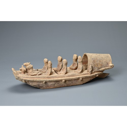 208 - A CHINESE POTTERY MODEL OF A BOAT WITH RUDDER, HAN DYNASTY STYLE. Close examples are known found in ... 