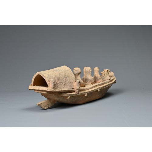 208 - A CHINESE POTTERY MODEL OF A BOAT WITH RUDDER, HAN DYNASTY STYLE. Close examples are known found in ... 