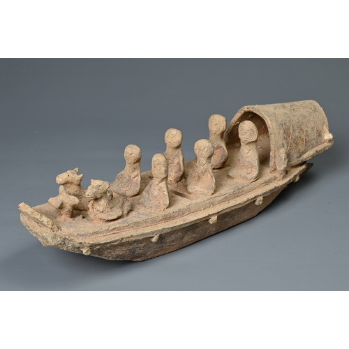 208 - A CHINESE POTTERY MODEL OF A BOAT WITH RUDDER, HAN DYNASTY STYLE. Close examples are known found in ... 