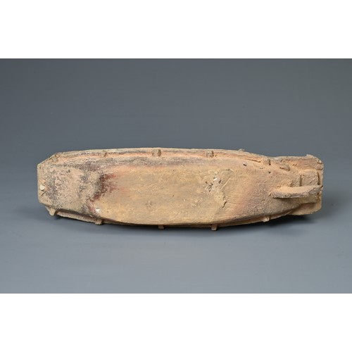 208 - A CHINESE POTTERY MODEL OF A BOAT WITH RUDDER, HAN DYNASTY STYLE. Close examples are known found in ... 