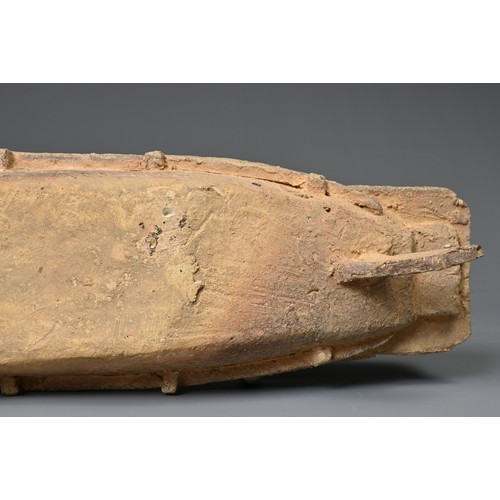 208 - A CHINESE POTTERY MODEL OF A BOAT WITH RUDDER, HAN DYNASTY STYLE. Close examples are known found in ... 